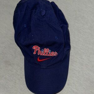 Mens OS Nike Navy Cap with Red Logo.